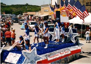 Kingsland Aqua Boom royalty at a parade in Burnet